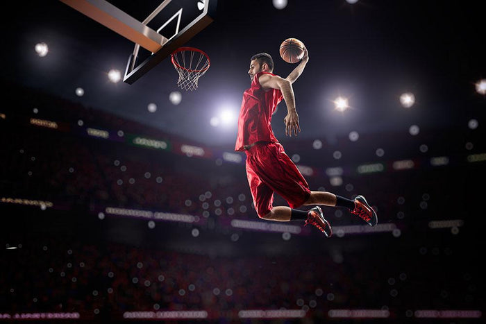 Red Basketball player in action Wall Mural Wallpaper