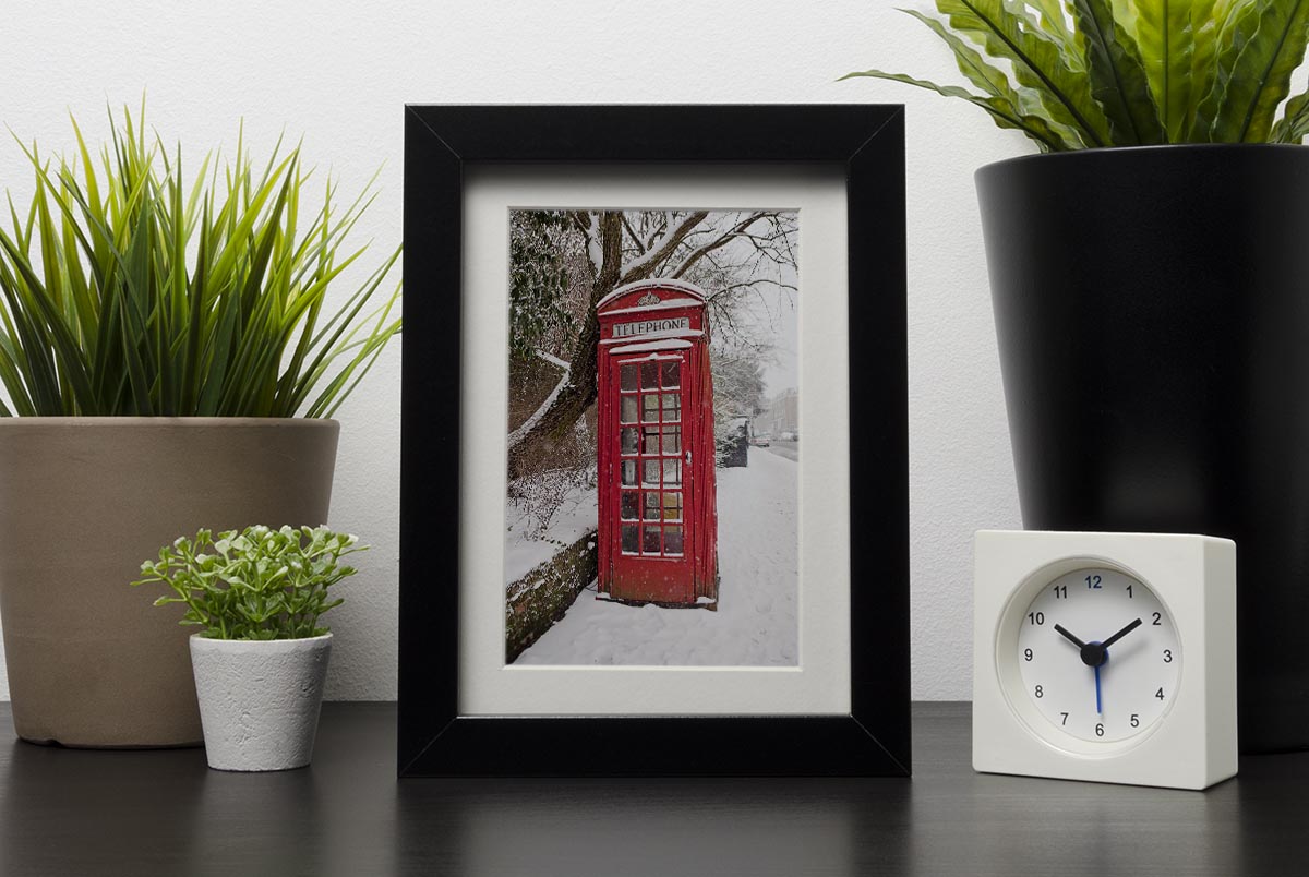 Red Telephone Box in the Snow Framed Print - Canvas Art Rocks - 1