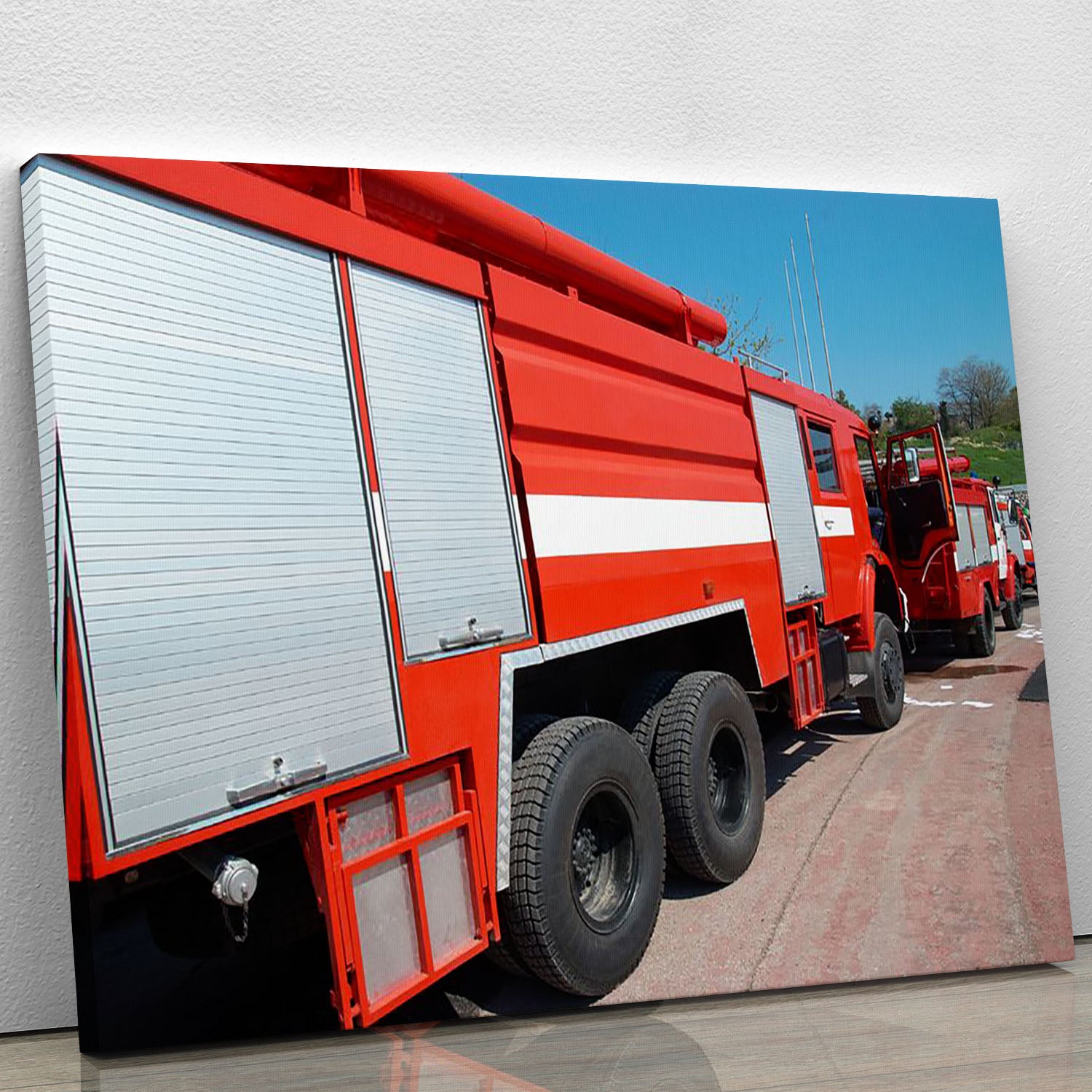 Red fire engine standing on the road Canvas Print or Poster - Canvas Art Rocks - 1
