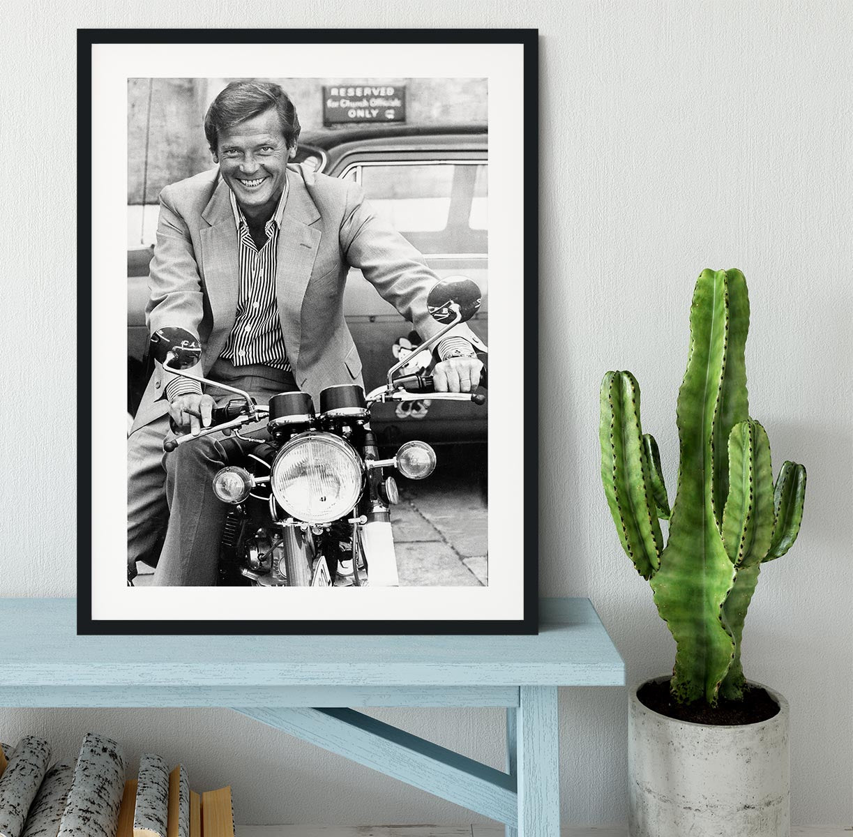 Roger Moore on a motorbike Framed Print - Canvas Art Rocks - 1