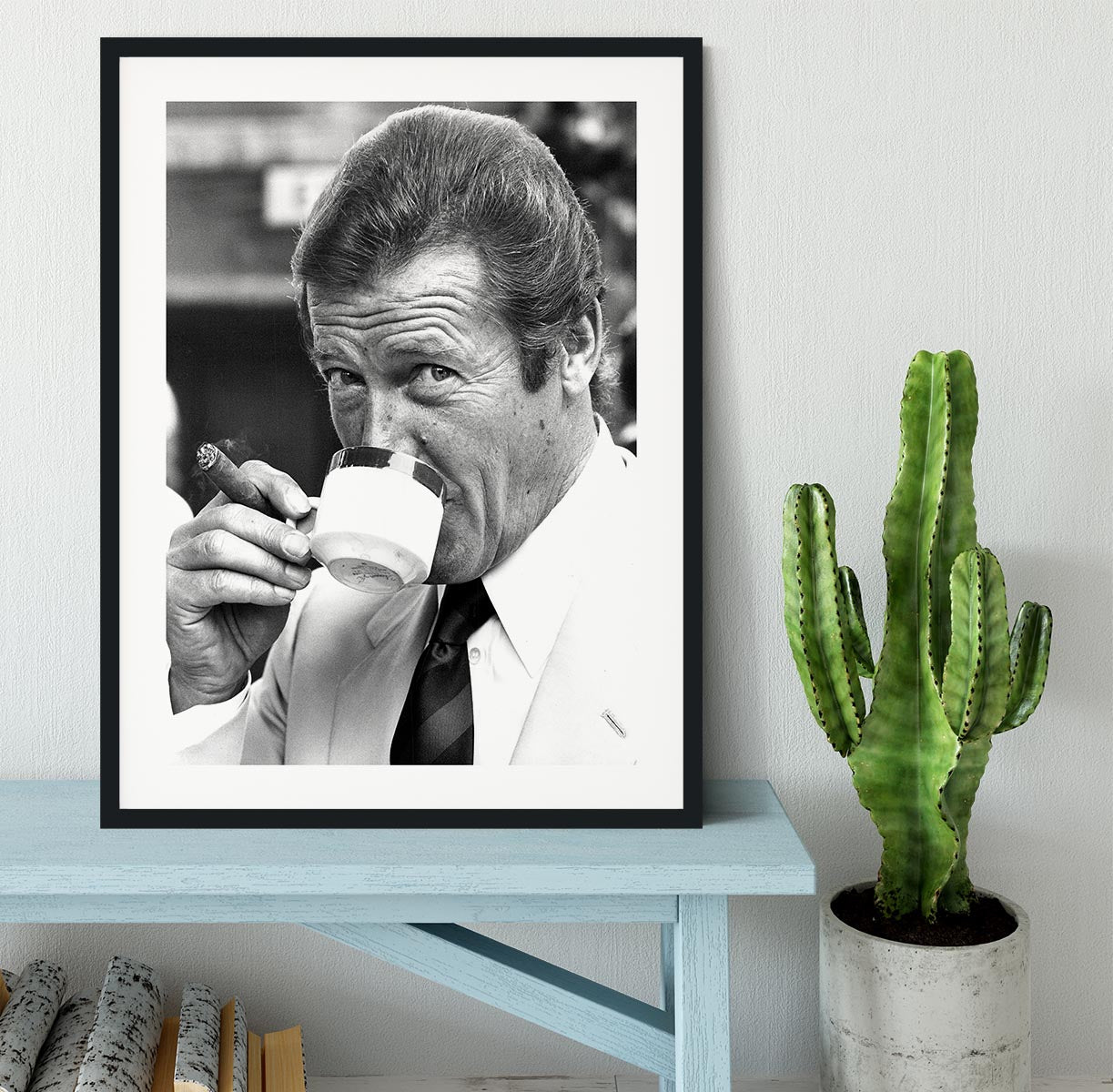 Roger Moore with coffee and a cigar Framed Print - Canvas Art Rocks - 1