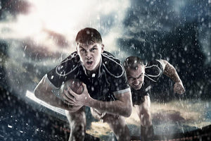Rugby players running in the rain Wall Mural Wallpaper - Canvas Art Rocks - 1