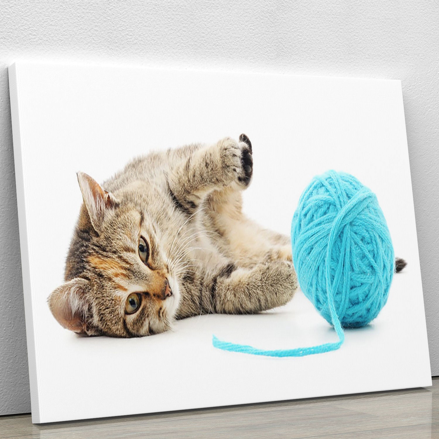Small funny kitten and clew of thread Canvas Print or Poster - Canvas Art Rocks - 1