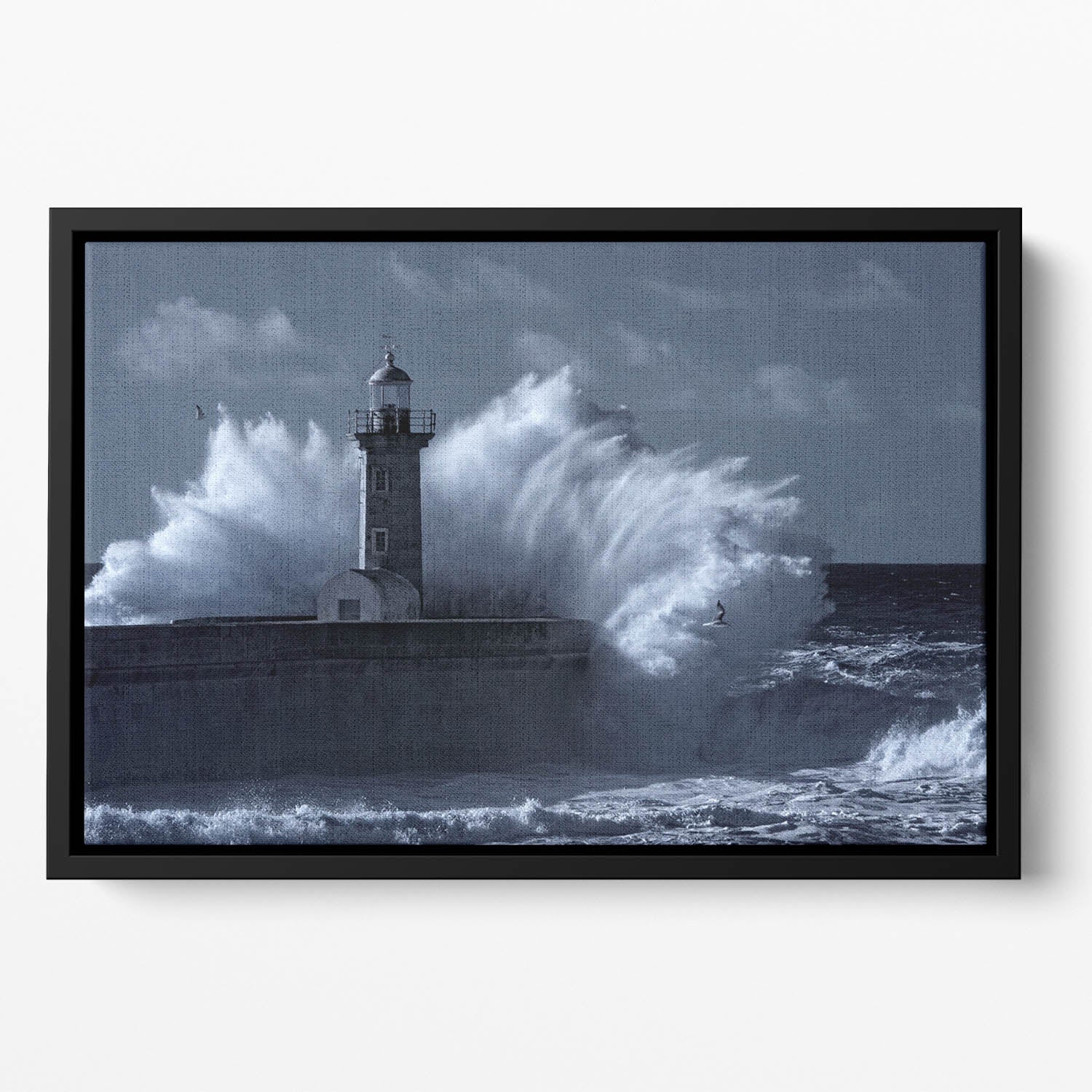 Stormy waves over old lighthouse Floating Framed Canvas