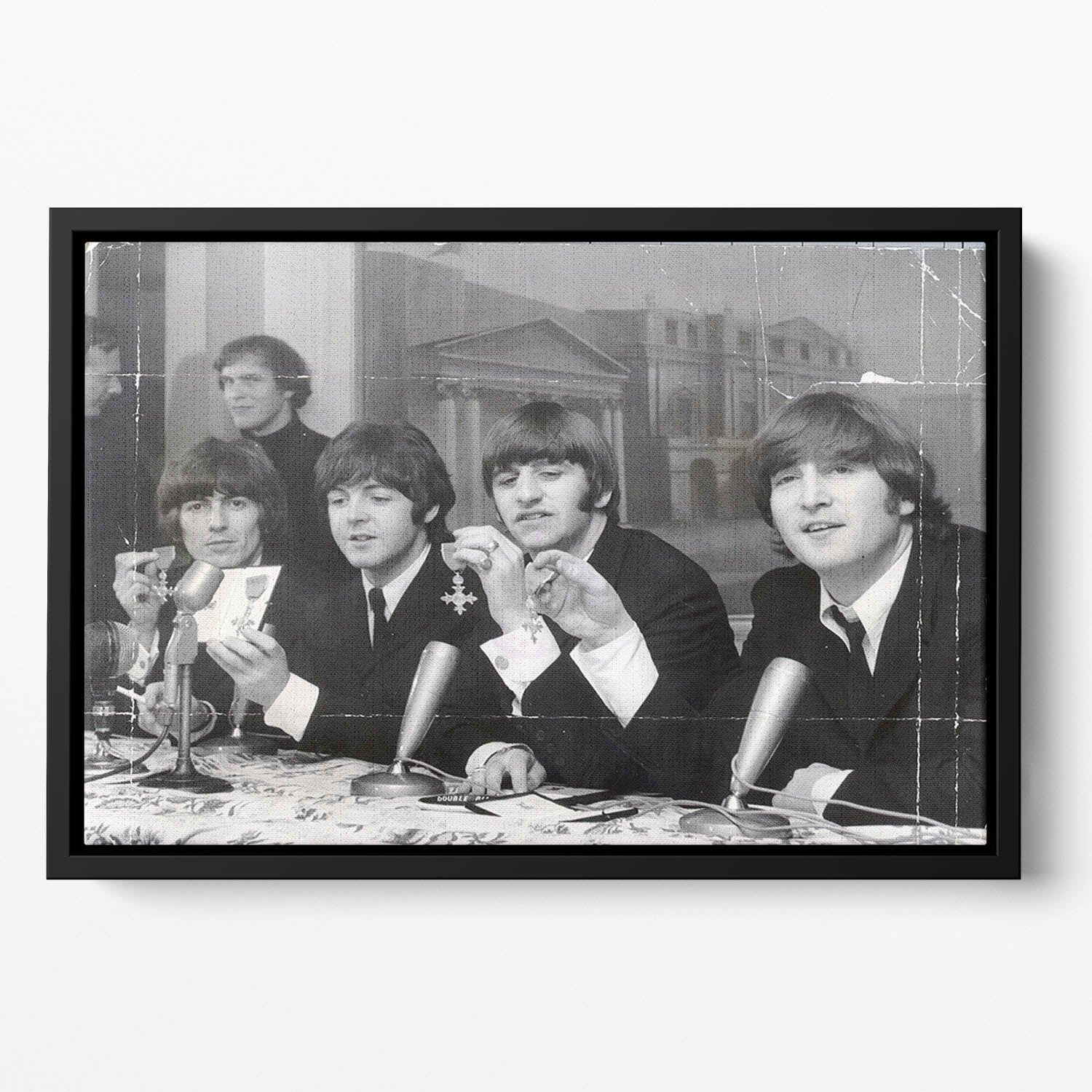 The Beatles at a press conference with their MBEs Floating Framed Canvas
