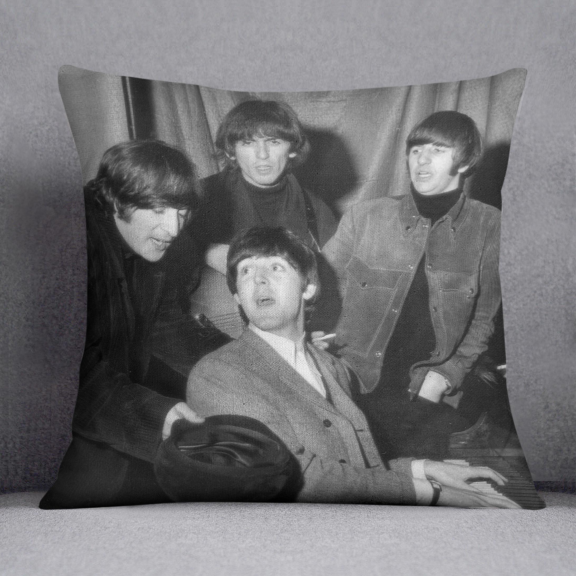 The Beatles gathered round a piano Cushion