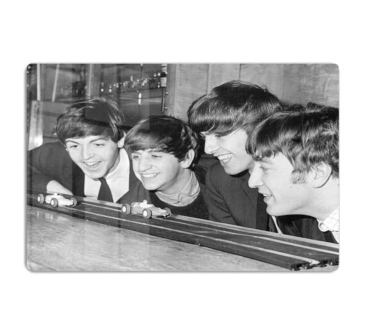 The Beatles play with toy racing cars HD Metal Print