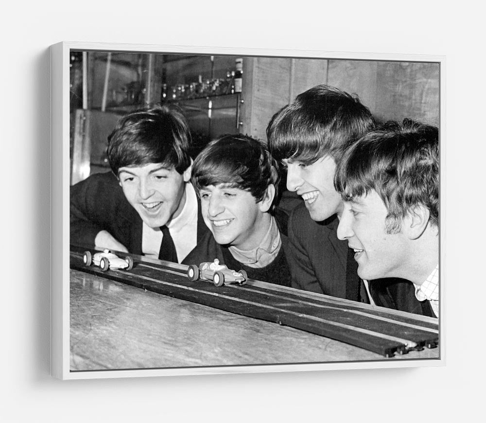 The Beatles play with toy racing cars HD Metal Print