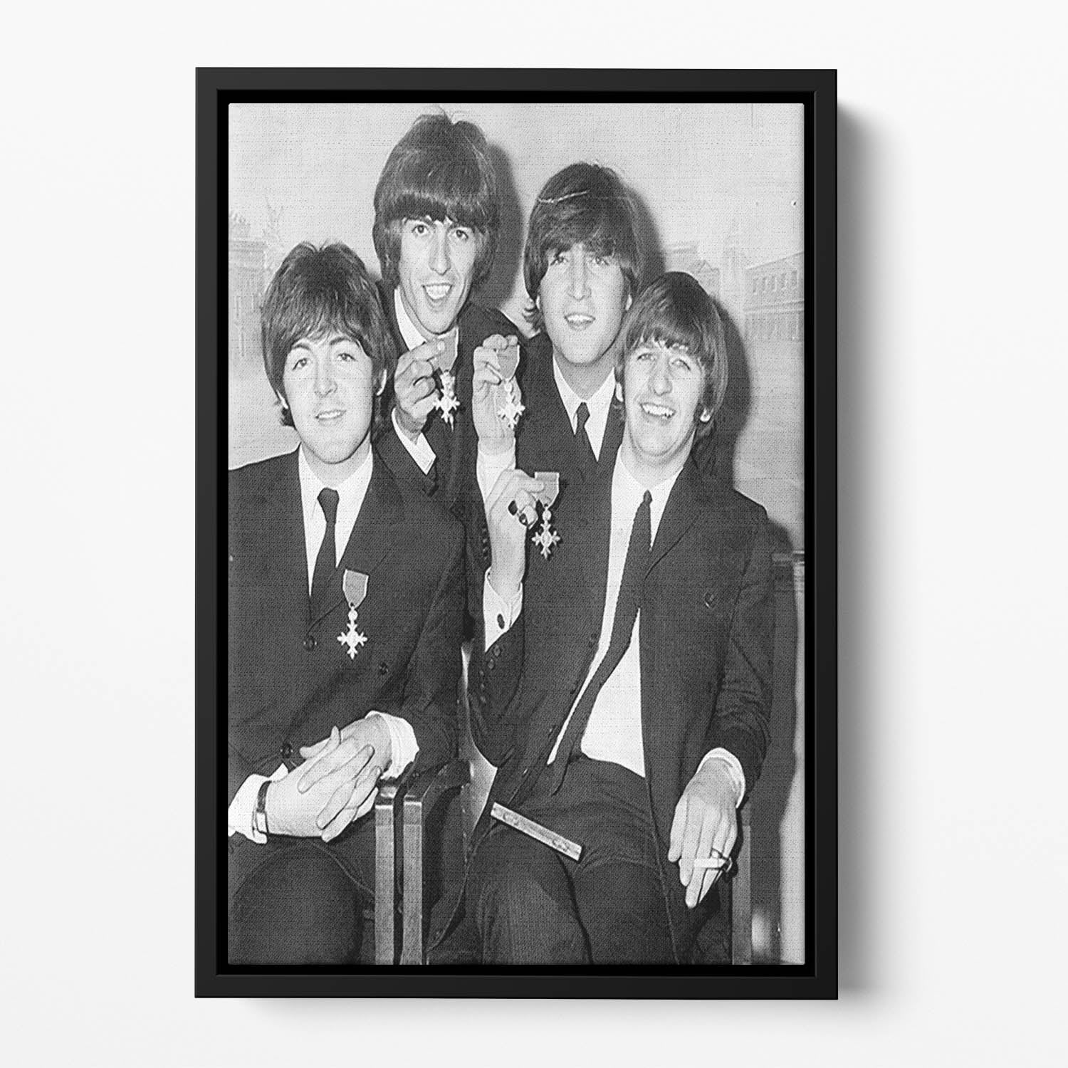The Beatles sitting with their MBEs Floating Framed Canvas