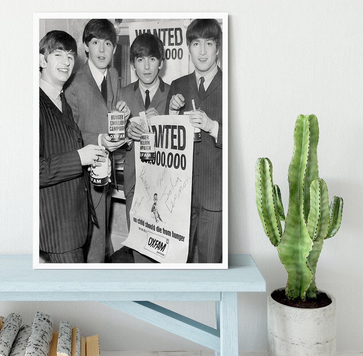 The Beatles with an Oxfam poster Framed Print - Canvas Art Rocks -6