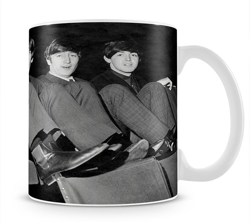 The Beatles with feet up in 1963 Mug - Canvas Art Rocks - 1