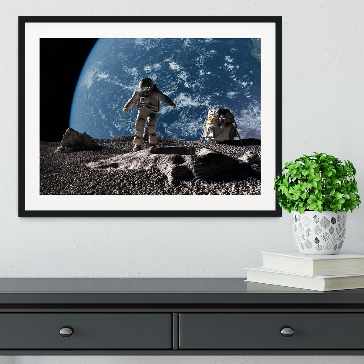 The astronaut on a background of a planet Framed Print - Canvas Art Rocks - 1