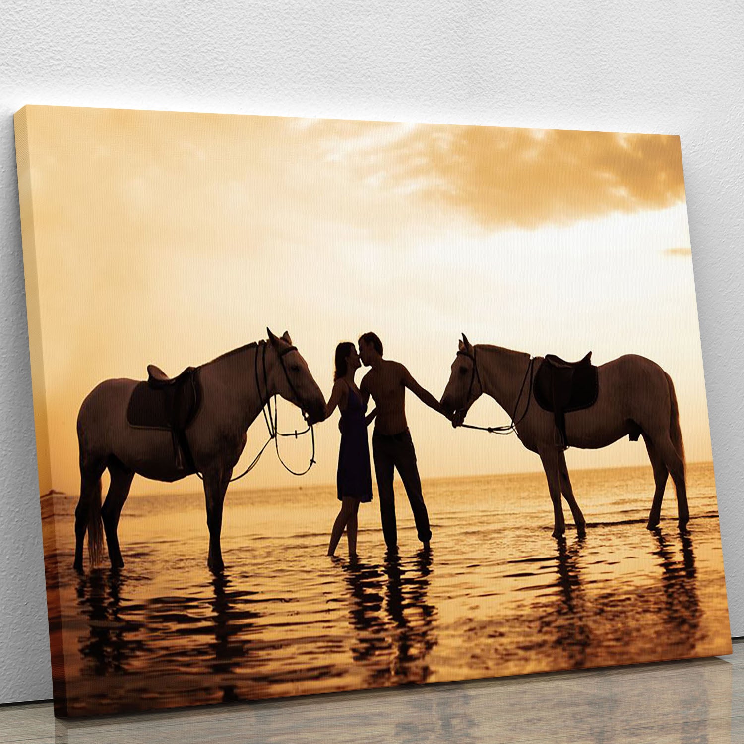 The image of a couple in love at sunset in the sea Canvas Print or Poster - Canvas Art Rocks - 1