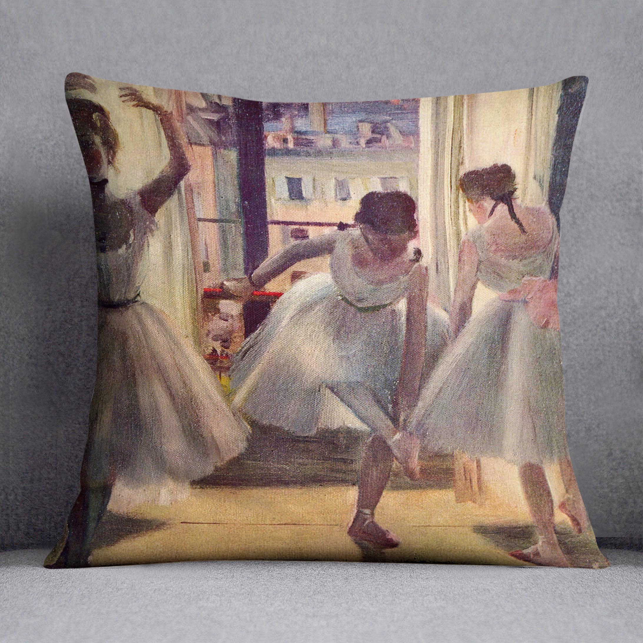 Three dancers in a practice room by Degas Cushion