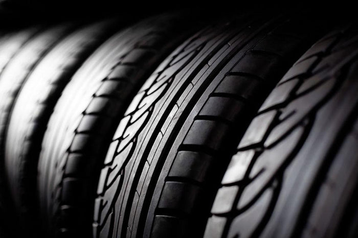 Tire stack background Wall Mural Wallpaper