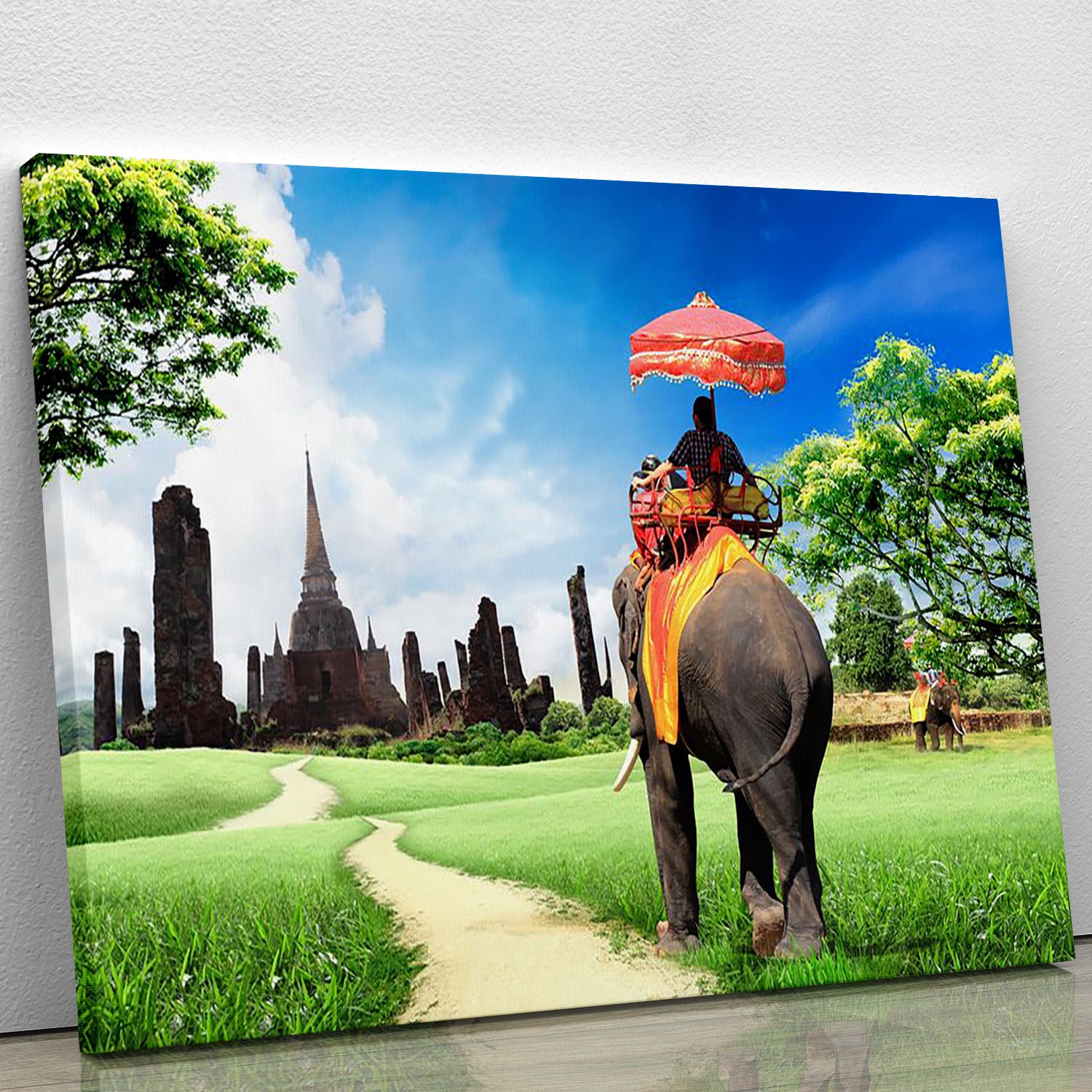 Travel concept tourists on an elephant Canvas Print or Poster - Canvas Art Rocks - 1
