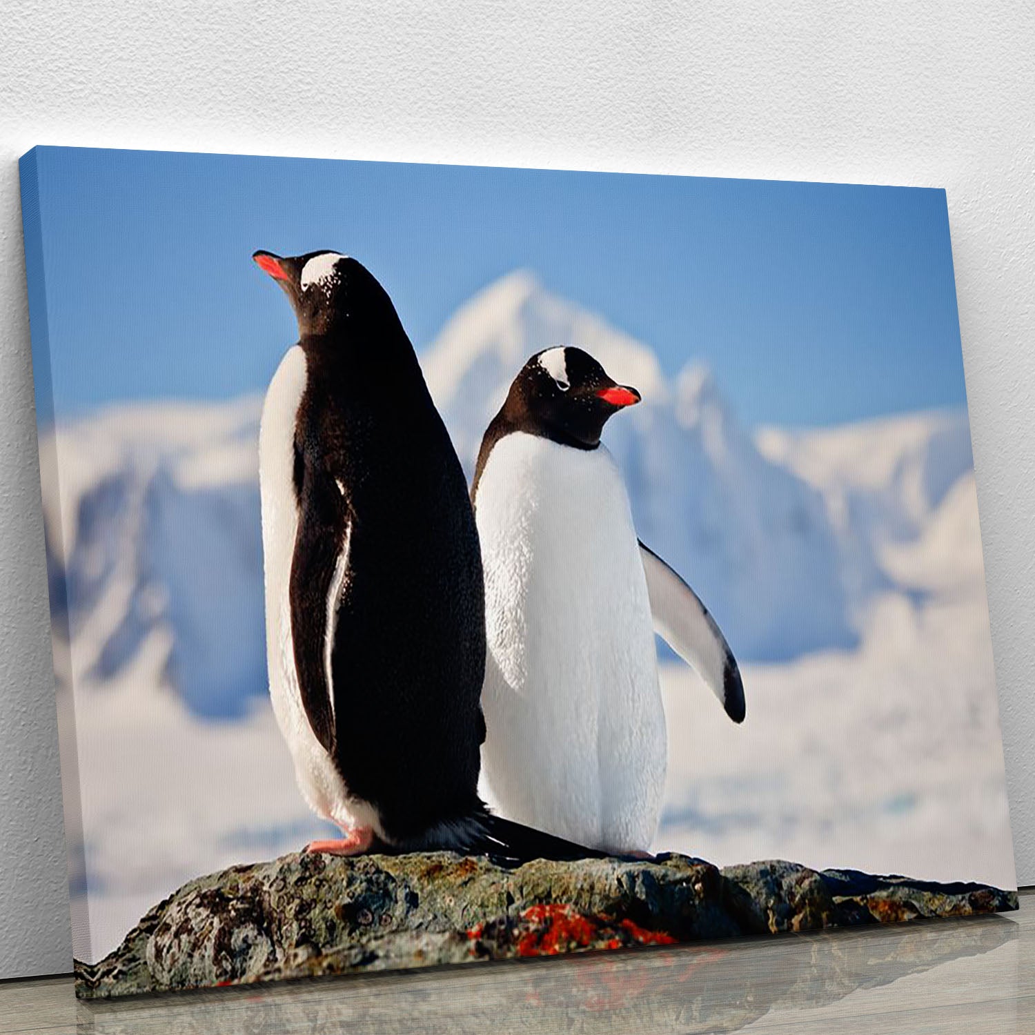 Two penguins dreaming sitting on a rock Canvas Print or Poster - Canvas Art Rocks - 1