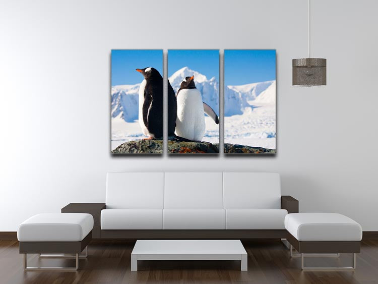Two penguins dreaming together sitting on a rock 3 Split Panel Canvas Print - Canvas Art Rocks - 3