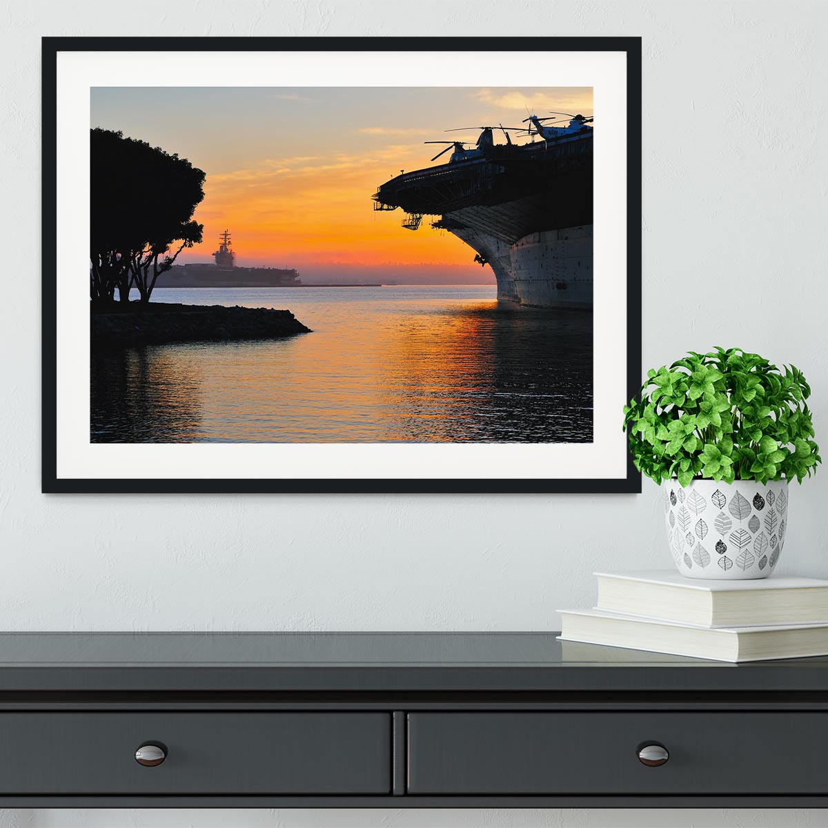 aircraft carrier in harbour in sunset Framed Print - Canvas Art Rocks - 1