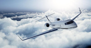 private jet flying over the earth Wall Mural Wallpaper - Canvas Art Rocks - 1
