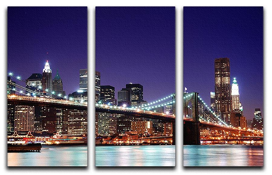 skyscrapers over Hudson River illuminated lights at dusk 3 Split Panel Canvas Print - Canvas Art Rocks - 1