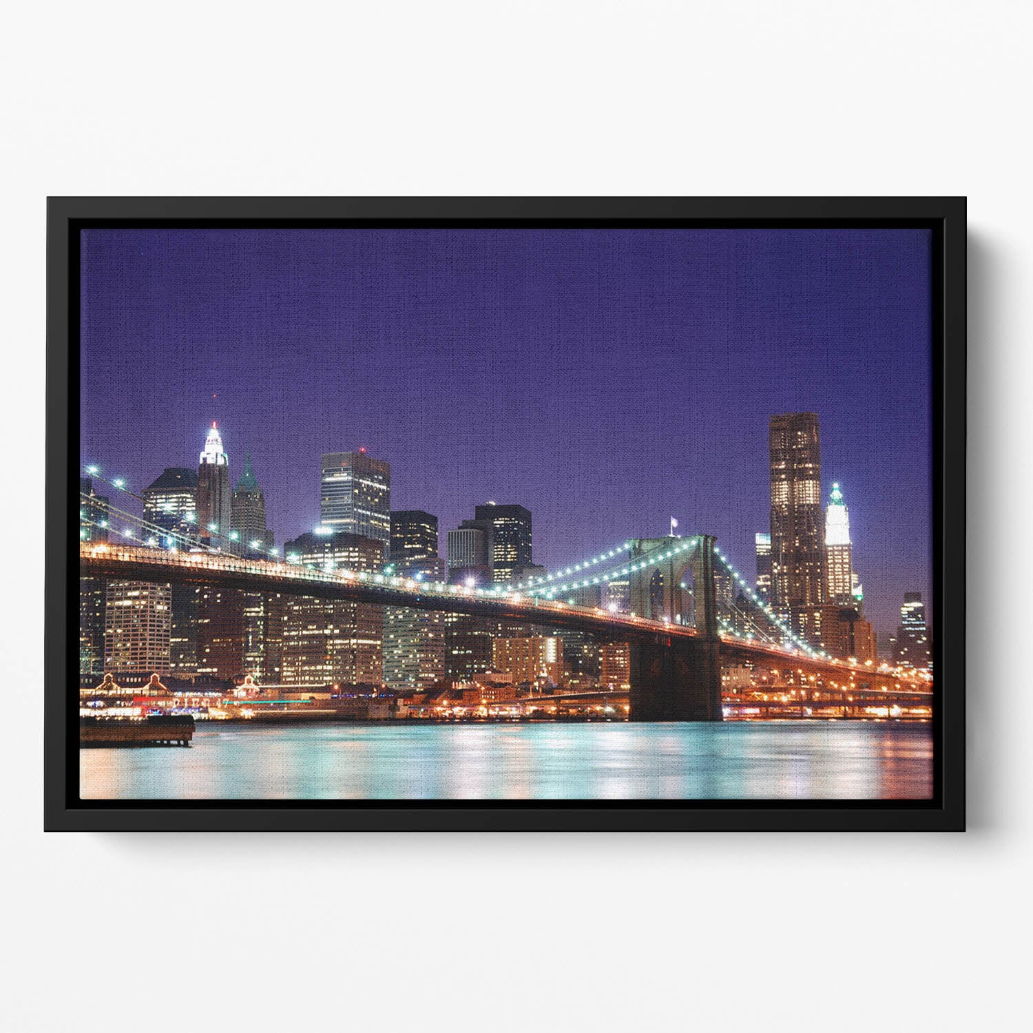 skyscrapers over Hudson River illuminated lights at dusk Floating Framed Canvas
