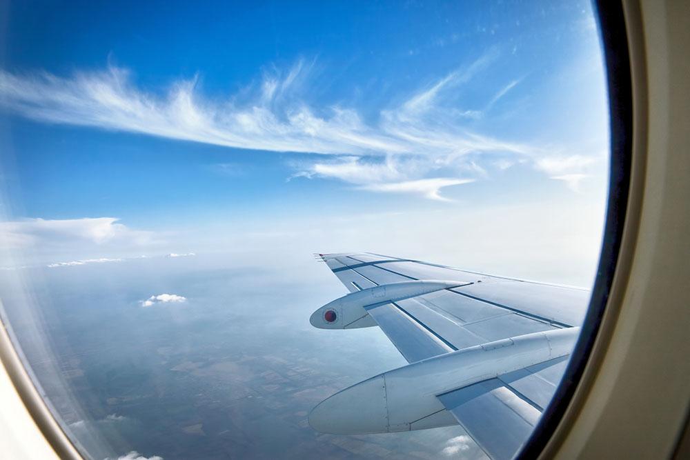 window aircraft during flight Wall Mural Wallpaper - Canvas Art Rocks - 1